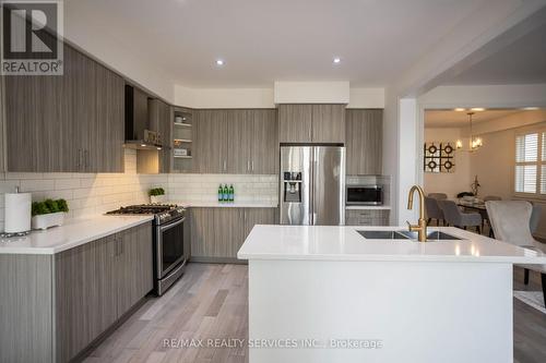 103 Kay Crescent, Centre Wellington, ON - Indoor Photo Showing Kitchen With Stainless Steel Kitchen With Double Sink With Upgraded Kitchen