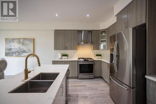 103 Kay Crescent, Centre Wellington, ON - Indoor Photo Showing Kitchen With Stainless Steel Kitchen With Double Sink With Upgraded Kitchen