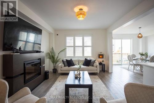 103 Kay Crescent, Centre Wellington, ON - Indoor Photo Showing Living Room With Fireplace