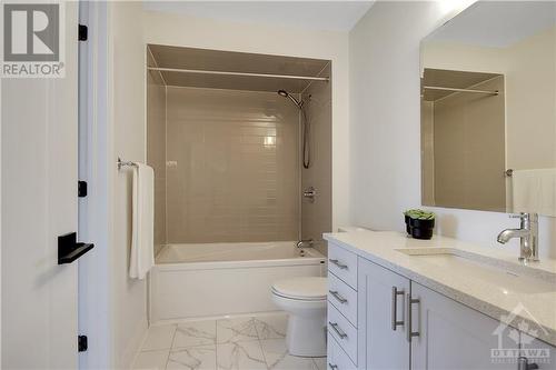 Modern Main Bathroom with Quartz Countertop - 721 Capricorn Circle, Ottawa, ON - Indoor Photo Showing Bathroom