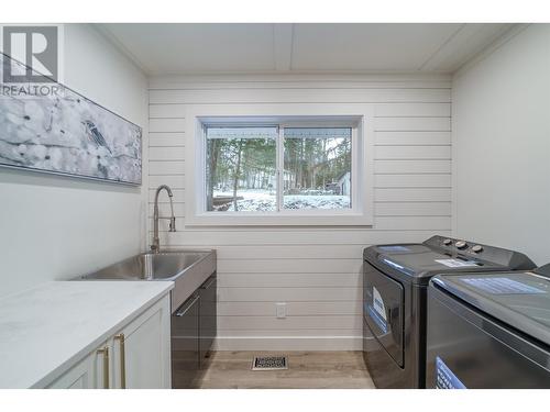 4937 Kyllo Road, 108 Mile Ranch, BC - Indoor Photo Showing Laundry Room