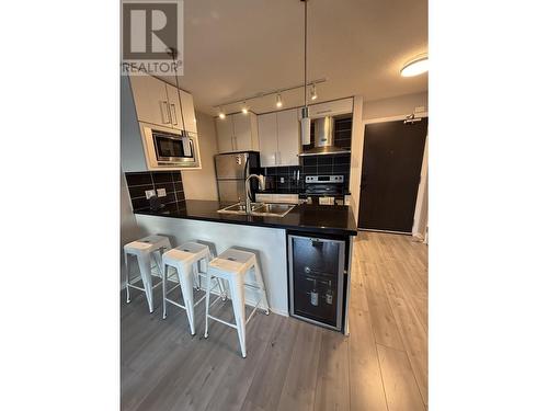 1207 689 Abbott Street, Vancouver, BC - Indoor Photo Showing Kitchen With Double Sink