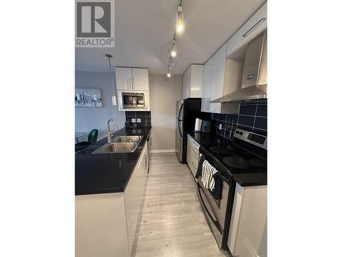 1207 689 Abbott Street, Vancouver, BC - Indoor Photo Showing Kitchen With Double Sink