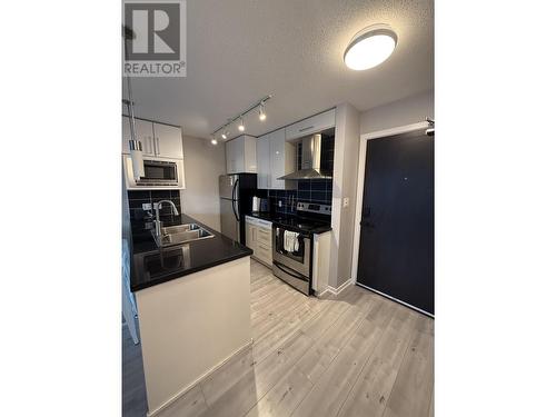 1207 689 Abbott Street, Vancouver, BC - Indoor Photo Showing Kitchen With Double Sink