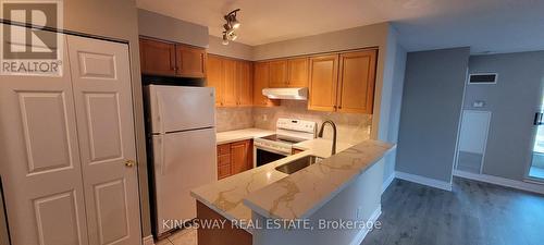 812 - 7 Lorraine Drive, Toronto, ON - Indoor Photo Showing Kitchen