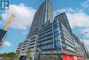 N337 - 7 Golden Lion Heights, Toronto, ON  - Outdoor With Balcony With Facade 