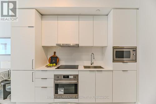 N337 - 7 Golden Lion Heights, Toronto, ON - Indoor Photo Showing Kitchen