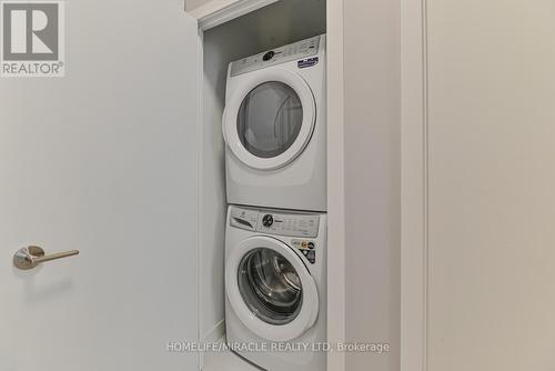 N337 - 7 Golden Lion Heights, Toronto, ON - Indoor Photo Showing Laundry Room