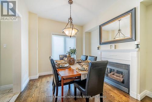 29 - 180 Blue Willow Drive, Vaughan (East Woodbridge), ON - Indoor Photo Showing Dining Room With Fireplace