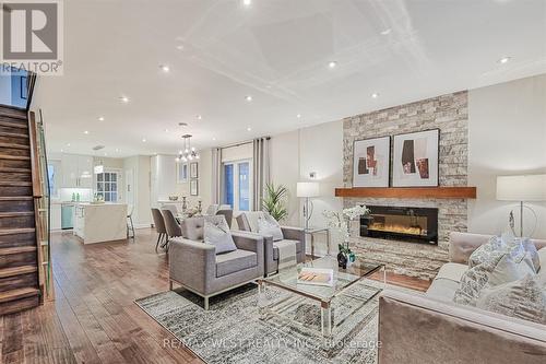 427 Strathmore Boulevard, Toronto, ON - Indoor Photo Showing Living Room With Fireplace