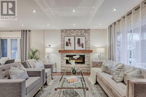 427 Strathmore Boulevard, Toronto, ON - Indoor Photo Showing Living Room With Fireplace