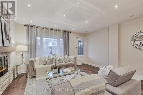 427 Strathmore Boulevard, Toronto, ON - Indoor Photo Showing Living Room With Fireplace