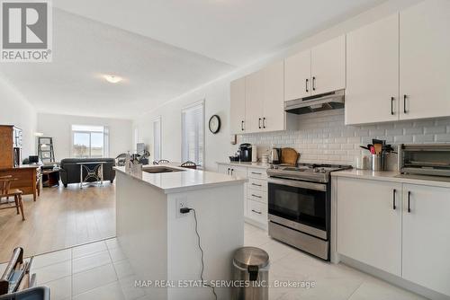 81 Season Crescent, Wasaga Beach, ON - Indoor Photo Showing Kitchen With Upgraded Kitchen