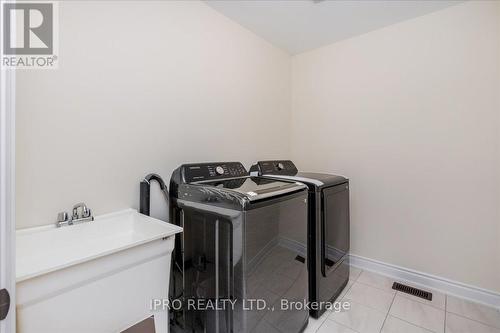 78 Lorne Thomas Place, New Tecumseth, ON - Indoor Photo Showing Laundry Room