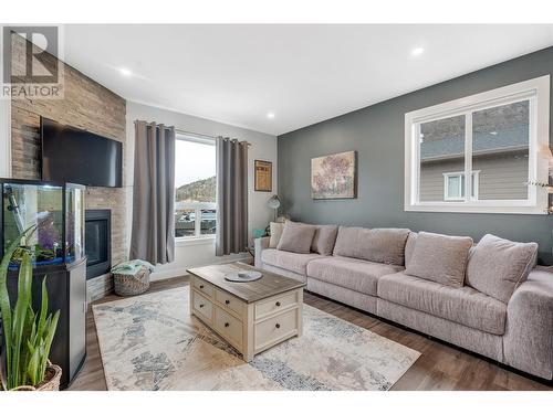 8752 Palmer Place, Summerland, BC - Indoor Photo Showing Living Room With Fireplace