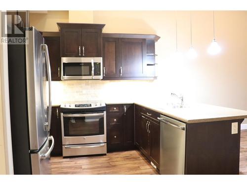 9100 Mackie Drive Unit# 210, Coldstream, BC - Indoor Photo Showing Kitchen