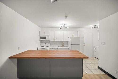 110 70 Maryland Street, Winnipeg, MB - Indoor Photo Showing Kitchen With Double Sink