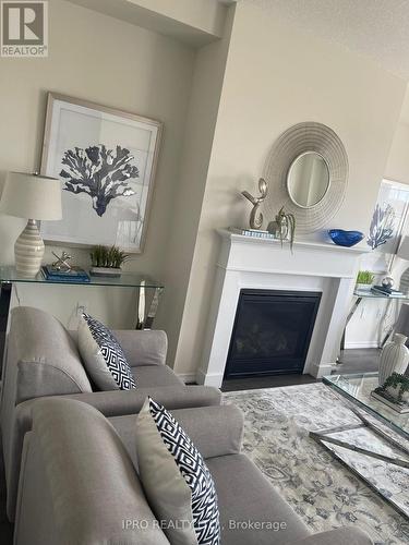 8 Toffee Trail, Hamilton, ON - Indoor Photo Showing Living Room With Fireplace