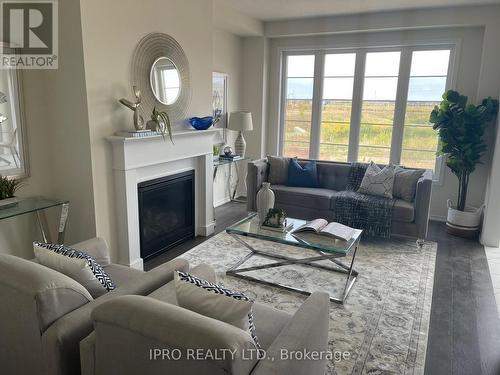 8 Toffee Trail, Hamilton, ON - Indoor Photo Showing Living Room With Fireplace