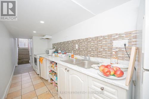 23 Lyndhurst Street, Hamilton, ON - Indoor Photo Showing Kitchen With Double Sink