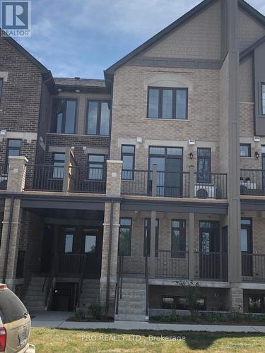 104 - 333 Gosling Gardens, Guelph, ON - Outdoor With Facade