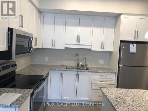 104 - 333 Gosling Gardens, Guelph, ON - Indoor Photo Showing Kitchen With Double Sink With Upgraded Kitchen