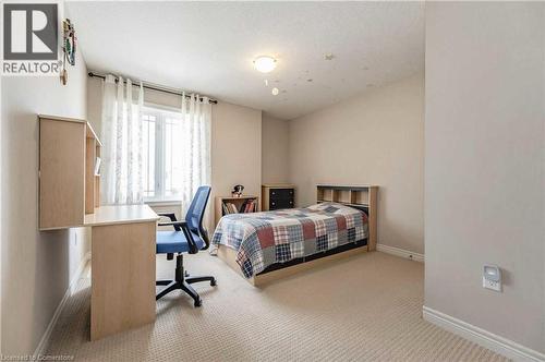 View of carpeted bedroom - 243 Greenwater Place Unit# Upper, Kitchener, ON - Indoor Photo Showing Bedroom