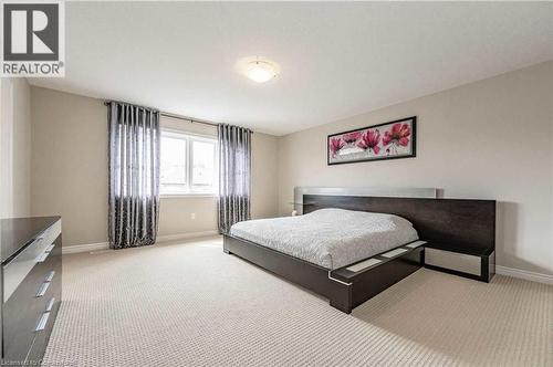 View of carpeted bedroom - 243 Greenwater Place Unit# Upper, Kitchener, ON - Indoor Photo Showing Bedroom