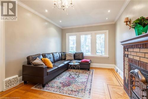 53 Tuxedo Avenue S, Hamilton, ON - Indoor Photo Showing Living Room With Fireplace