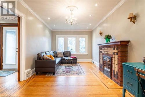 53 Tuxedo Avenue S, Hamilton, ON - Indoor Photo Showing Living Room With Fireplace