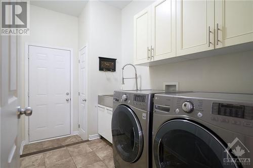 Main Floor Laundry - 132 Palfrey Way, Stittsville, ON - Indoor Photo Showing Laundry Room