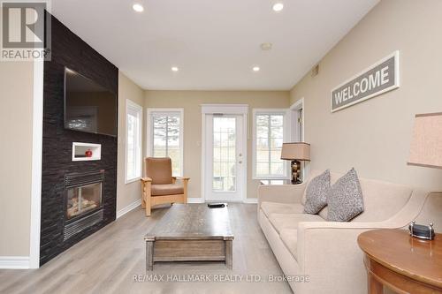 2014/15 - 90 Highland Drive, Oro-Medonte, ON - Indoor Photo Showing Living Room With Fireplace