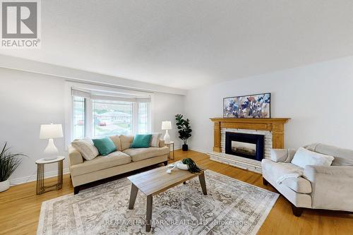 690 Adelaide Avenue E, Oshawa, ON - Indoor Photo Showing Living Room With Fireplace