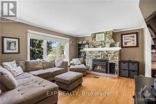 3785 34, Champlain, ON - Indoor Photo Showing Living Room With Fireplace