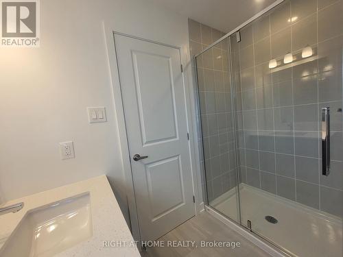 Ensuite with Glass elegant shower & stone countertops - 32 Overberg Way, Kanata (9010 - Kanata - Emerald Meadows/Trailwest), ON - Indoor Photo Showing Bathroom