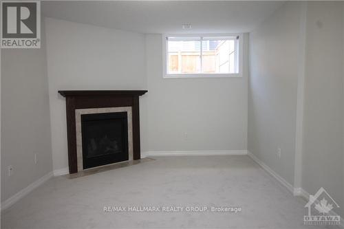 223 Overberg Way, Ottawa, ON - Indoor With Fireplace