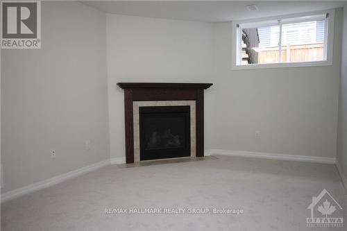 223 Overberg Way, Ottawa, ON - Indoor With Fireplace