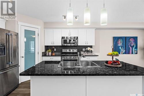 402 940 Bradley Street, Moose Jaw, SK - Indoor Photo Showing Kitchen With Double Sink With Upgraded Kitchen