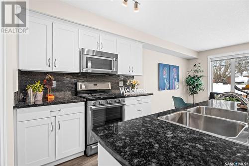 402 940 Bradley Street, Moose Jaw, SK - Indoor Photo Showing Kitchen With Double Sink