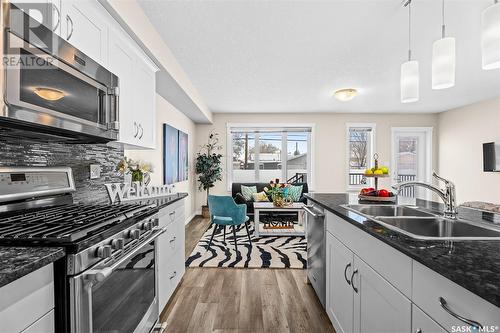 402 940 Bradley Street, Moose Jaw, SK - Indoor Photo Showing Kitchen With Double Sink