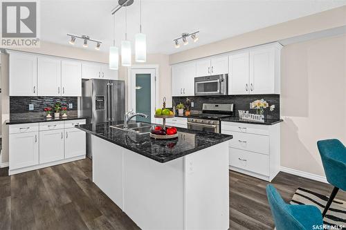 402 940 Bradley Street, Moose Jaw, SK - Indoor Photo Showing Kitchen With Double Sink With Upgraded Kitchen