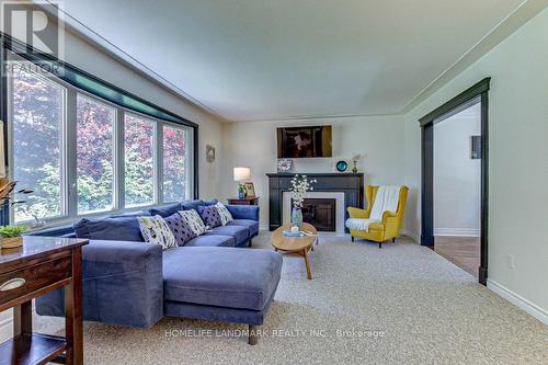 7 Meridene Crescent E, London, ON - Indoor Photo Showing Living Room With Fireplace