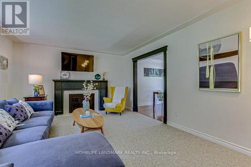 7 Meridene Crescent E, London, ON - Indoor Photo Showing Living Room With Fireplace