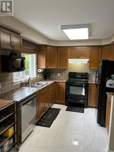 136 - 1512 Walkley Road, Ottawa, ON - Indoor Photo Showing Kitchen With Double Sink