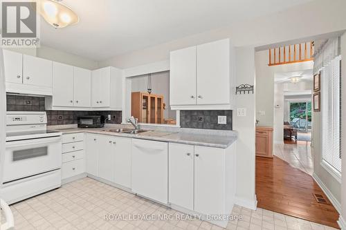 44 - 15 Lakeside Drive, St. Catharines (Port Weller), ON - Indoor Photo Showing Kitchen With Double Sink