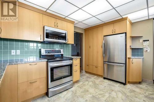 5131 Veronica Road Nw, Calgary, AB - Indoor Photo Showing Kitchen