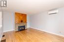 211 Humphrey Street, Moncton, NB  - Indoor Photo Showing Living Room With Fireplace 