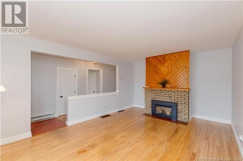 211 Humphrey Street, Moncton, NB - Indoor Photo Showing Living Room With Fireplace