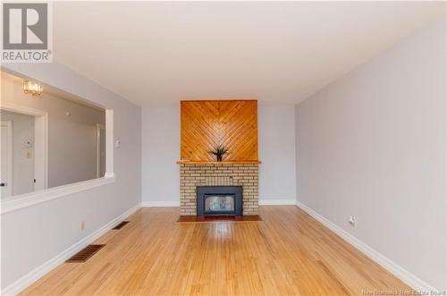 211 Humphrey Street, Moncton, NB - Indoor Photo Showing Living Room With Fireplace