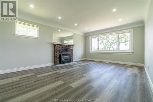 6549 8Th Line, North Buxton, ON - Indoor Photo Showing Living Room With Fireplace